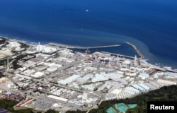 Pembangkit listrik tenaga nuklir Fukushima Daiichi, yang mulai melepaskan air radioaktif yang telah diolah ke Samudra Pasifik, di kota Okuma, prefektur Fukushima, Jepang 24 Agustus 2023. (Kyodo/via REUTERS)