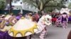 Members of Krewe of Mung Beans perform traditional dance during the Krewe of Dead Beans parade in New Orleans on Feb. 20. It is the inaugural parade of the Krewe of Mung Beans, the first Carnival season group with membership that is predominantly Vietnamese-American. 