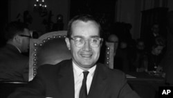 FILE - Newton Minow, Chairman of the Federal Communications Commission, appears before the House Antitrust Subcommittee which is probing newspaper competition, March 13, 1963, in Washington. 