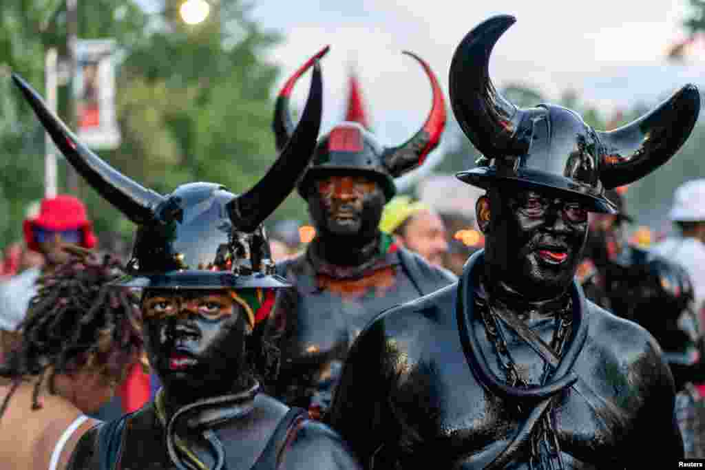 Revelers take part in a J&#39;ouvert celebration in the Brooklyn borough of New York City.