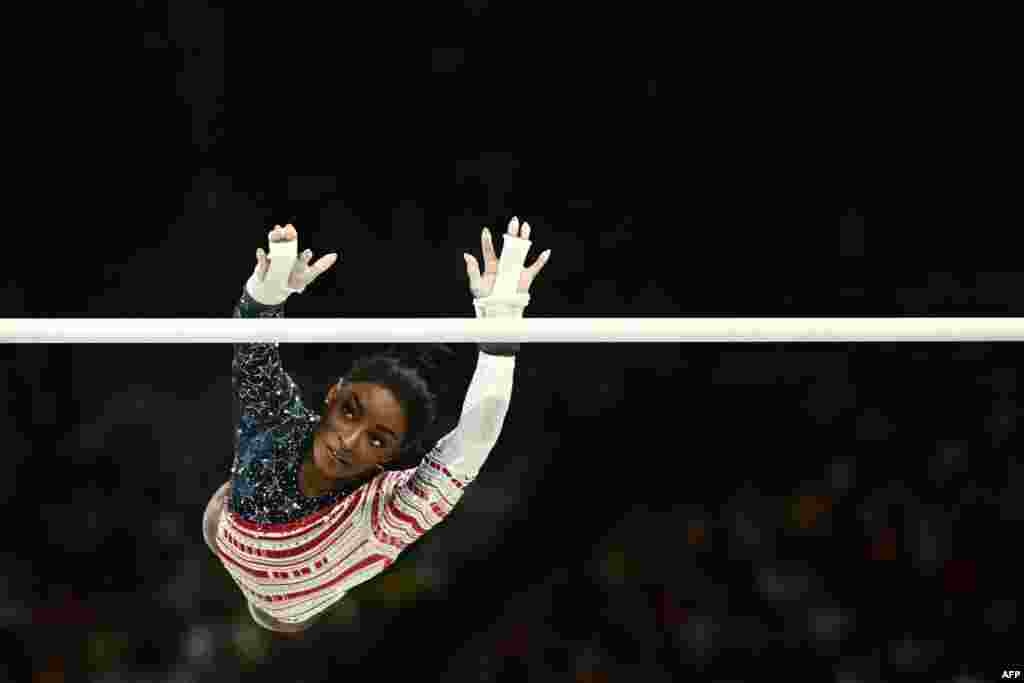 Simone Biles of the United States competes in the uneven bars event of the artistic gymnastics women&#39;s team final during the Paris 2024 Olympic Games at the Bercy Arena in Paris, France.