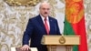 FILE - Belarusian President Alexander Lukashenko takes the oath of office at the Palace of the Independence in Minsk, Belarus, Sept. 23, 2020. Lukashenko pardoned 20 more people who rights activists describe as political prisoners, a statement on his website said on Saturday.