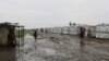 FILE — Tents at the Muyange site in Gatumba, Burundi, battered by rain.