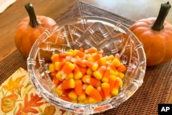 This image shows a bowl of candy corn in Westchester County, New York, Oct. 23, 2023.