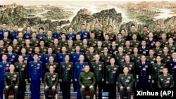 中国领导人习近平在全国人大会议期出席解放军和武警部队代表团全体会议。（2023年3月8日）
