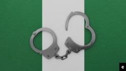 A half opened steel handcuff in center on top of the national flag of Nigeria (Adobe Stock)