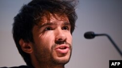 FILE - Franco-Spanish lawyer Juan Branco representing Senegalese opposition leader Ousmane Sonko, speaks during a press conference in Paris on June 22, 2023. 