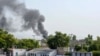 Smoke rises following an explosion after suicide squad allegedly attempted to storm an army cantonment that houses military residences and offices in Bannu on July 15, 2024.