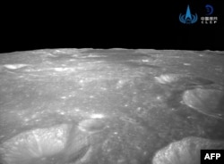 This undated handout photo taken by the China National Space Administration (CNSA) and released on June 4, 2024 shows a general view of craters on the surface of the moon captured by China's Chang'e-6 lunar probe.