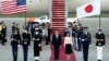 Japan's Prime Minister Fumio Kishida, center left, and his wife, Yuko Kishida, center right, participate in an arrival ceremony at Andrews Air Force Base, Maryland, April 8, 2024. 