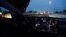 FILE - A Tesla Model 3 vehicle drives on autopilot along the 405 highway in Westminster, California, March 16, 2022. 