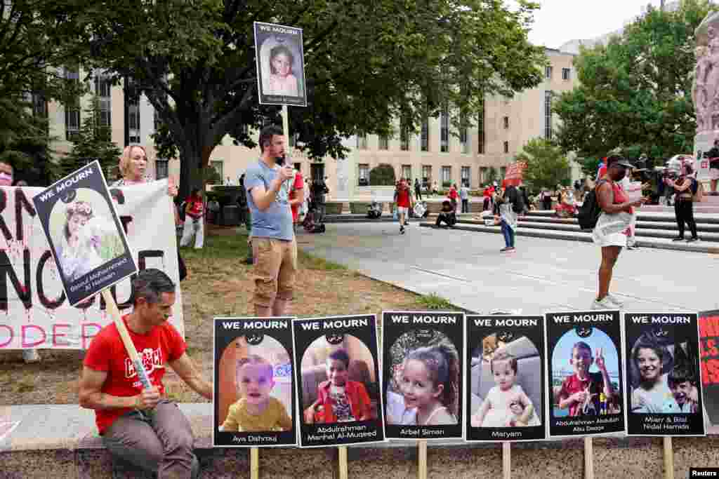 A man sits next to placards, as Pro-Palestinian demonstrators protest on the day of Netanyahu&#39;s address to a joint meeting of the U.S. Congress, on Capitol Hill in Washington, July 24, 2024.