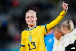 Sweden's Amanda Ilestedt celebrates at the end of the Women's World Cup quarterfinal soccer match between Japan and Sweden at Eden Park in Auckland, New Zealand, Aug. 11, 2023. Sweden won 2-1.