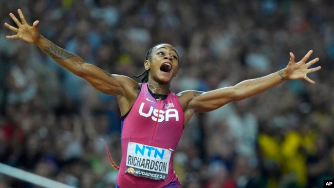 FILE - Sha'Carri Richardson, of the United States, celebrates after winning the gold medal in the final of the Women's 100-meters during the World Athletics Championships in Budapest, Hungary, Aug. 21, 2023.