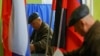 A man casts his ballot at a polling station during the Russia's presidential election in the course of Russia-Ukraine conflict in Donetsk, Russian-controlled Ukraine, March 16, 2024.