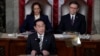 Japan's Prime Minister Fumio Kishida addresses a joint meeting of Congress in the House chamber, April 11, 2024, at the Capitol in Washington, as Vice President Kamala Harris and Speaker of the House Mike Johnson look on. 