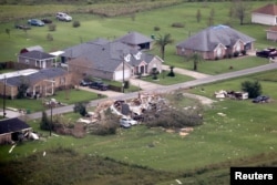 Hurricane Ida storm damage seen on September 3, 2021, in a neighborhood near LaPlace, Louisiana, a state where the population is shrinking