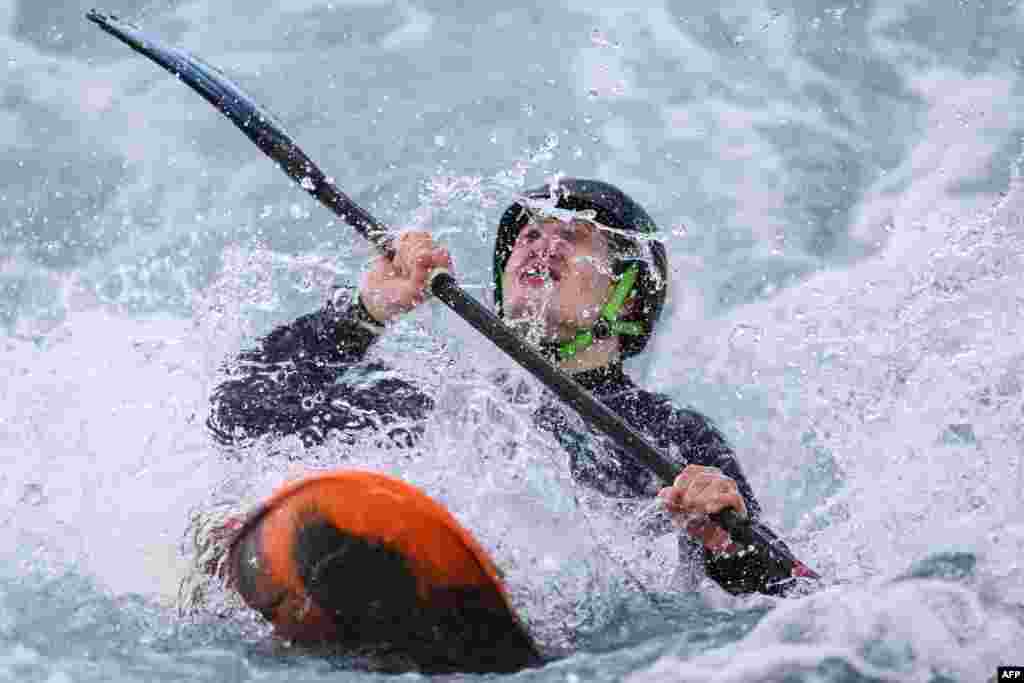 British Oscar Wyllie competes in the men&#39;s kayak cross junior time trial race during the Slalom &amp; Kayak Cross Selection Series, at Lee Valley White Water Centre, in Waltham Cross, north of London. (Photo by Adrian DENNIS / AFP)