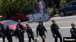 Local residents protest U.S. President Joe Biden's administration support of Israel amid the ongoing conflict between Israel and Hamas as U.S. Vice President Kamala Harris arrives to Oakland, California, June 5, 2024.