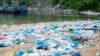 Plastic bags line a beach in Dong Hoa, Vietnam. (Greenhub/Ocean Conservancy)
