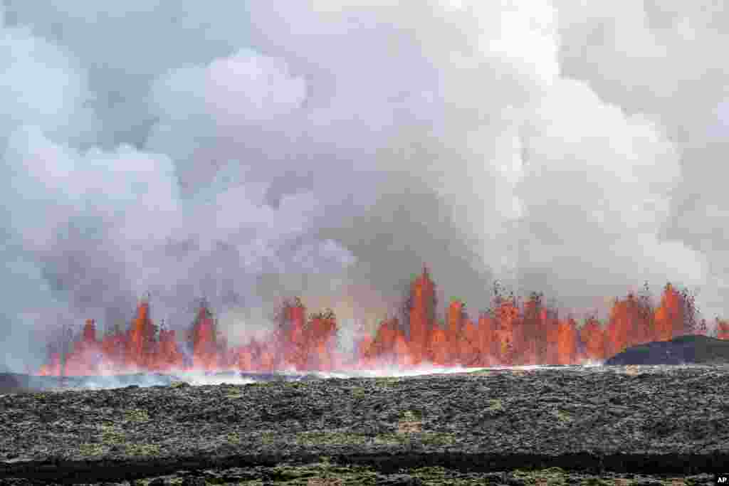 A volcano spews lava in Grindavik, Iceland.