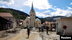 A view of the damage in the aftermath of floods in Crna na Koroskem, Slovenia, Aug. 7, 2023. Torrential rains three days earlier caused rivers to swell and burst into houses, villages and towns. 