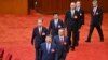 中共官媒新华社2024年7月18日发布照片显示，中共领导人习近平带领他的政治局常委成员出席中共二十届三中全会。