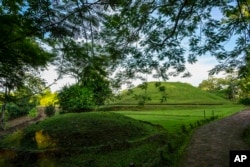 FILE - A view of the Moidams burial mounds in Charaideo, in upper Assam, India, Sept 27, 2022.