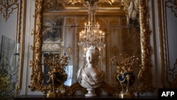 A bust of Queen Marie-Antoinette de Habsbourg-Lorraine, wife of France's King Louis XVI, sits in her bedroom in the chateau de Versailles, in Versailles, west of Paris, on June 19, 2023. 