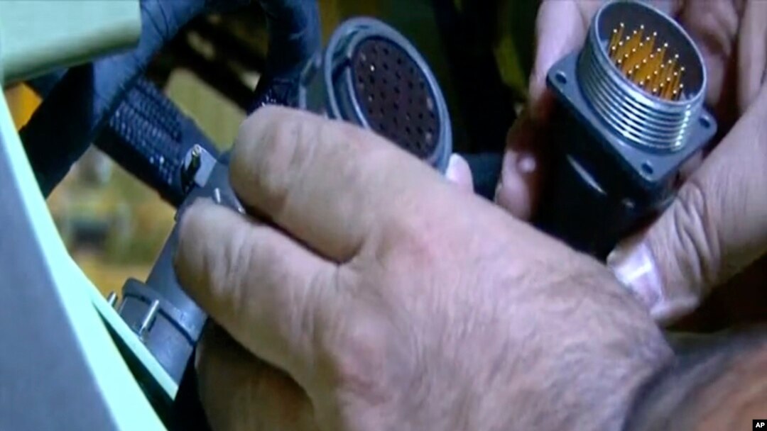 This frame grab from video footage released Aug. 31, 2023, by Iranian state television's IRINN network shows what officials described as faulty foreign parts that could be used in a missile or a drone.