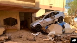 Flooding aftermath is seen in Derna, Libya, Sept.14, 2023. Search teams are combing streets, wrecked buildings, and even the sea to look for bodies in Derna, where the collapse of two dams unleashed a massive flash flood that killed thousands of people. 