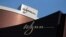 FILE - Company logos are displayed at Wynn Macau resort in Macau, China, Feb. 8, 2018. 