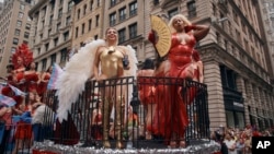 Revelers move along Fifth Avenue during the NYC Pride March, in New York City, June 30, 2024.