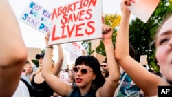 FILE - Abortion access advocates rally outside the U.S. Supreme Court on June 24, 2022, in Washington.