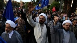 Iranian demonstrators chant slogans during an anti-Israeli gathering at the Felestin (Palestine) Square in Tehran, April 15, 2024. World leaders are urging Israel not to retaliate for Iran's weekend missile and drone attack.