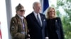Biden, with France visit, looks to past and future of global conflicts 