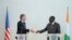 US Secretary of State Antony Blinken and President of Ivory Coast Alassane Ouattara shake hands after they delivered remarks following their meeting at the Residence of President in Abidjan, Jan. 23, 2024. 