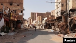 FILE - A view of a street in the city of Omdurman damaged in the year-long civil war in Sudan, April 7, 2024. 