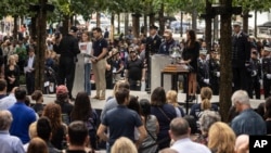 FILE - Names of victims are read during the commemoration ceremony on the 22nd anniversary of the Sept. 11, 2001, terror attacks on Monday, Sept. 11, 2023, in New York.