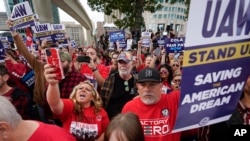 United Auto Workers members attend a rally in Detroit, Sept. 15, 2023.