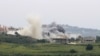 Smoke billows from the site of an Israeli airstrike on the southern Lebanese village of Tayr Harfa near the border on April 26, 2024.