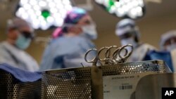 FILE - Instruments sit on a table in an operating room June 15, 2023, in Jackson, Tenn. Patients who take drugs like Wegovy may face life-threatening complications if they need surgery or other procedures that require empty stomachs for anesthesia.