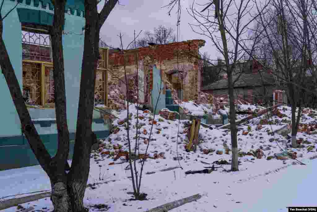 One of the many destroyed houses in downtown Kupiansk. The strategic railway hub is being bombed by Russian troops daily, Feb. 16, 2023.