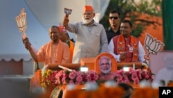 FILE - Indian Prime Minister Narendra Modi, center, campaigns in Ghaziabad, India, April 6, 2024. A U.S. report this week on religious freedom advised the State Department to designate India as one of 17 Countries of Particular Concern.