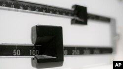 FILE- A close-up of a beam scale is seen in New York, April 3, 2018. Mounjaro, a drug approved to treat type 2 diabetes, has helped non-diabetics who were obese or overweight lose some 27 kilos of their body weight, a new study has found.