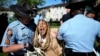 FILE—Georgia State Patrol officers detain a demonstrator on the campus of Emory University during a pro-Palestinian demonstration, April 25, 2024, in Atlanta.