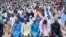 FILE - Nigerian Muslim attend Eid al-Adha prayers at an open field in Lagos, Nigeria on Wednesday, June 28, 2023.