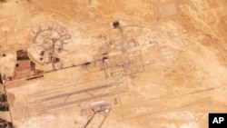 FILE—This satellite image from Planet Labs PBC shows the dual-use civilian airport and air base in Isfahan, Iran, April 18, 2024.