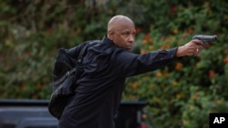 FILE - This image released by Sony Pictures Entertainment shows Denzel Washington in a scene from "The Equalizer 3."