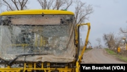 Not far from the front lines, the village of Torske was left destroyed and littered with cars, clothes and the personal items of Russian fighters after Ukraine re-took the area, pictured on April 6, 2023, in Torske, Ukraine. (Yan Boechat/VOA)